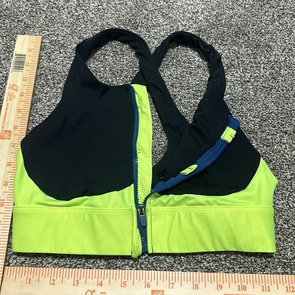 Fabletics and old navy black medium sports bras. Zipper front. Neon. Set of 2